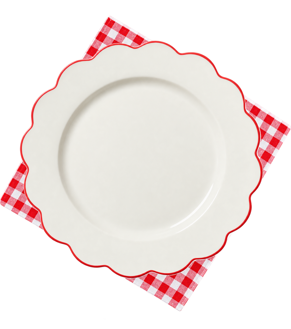 Assiette blanche festonnée sur une serviette vichy rouge, vue du dessus